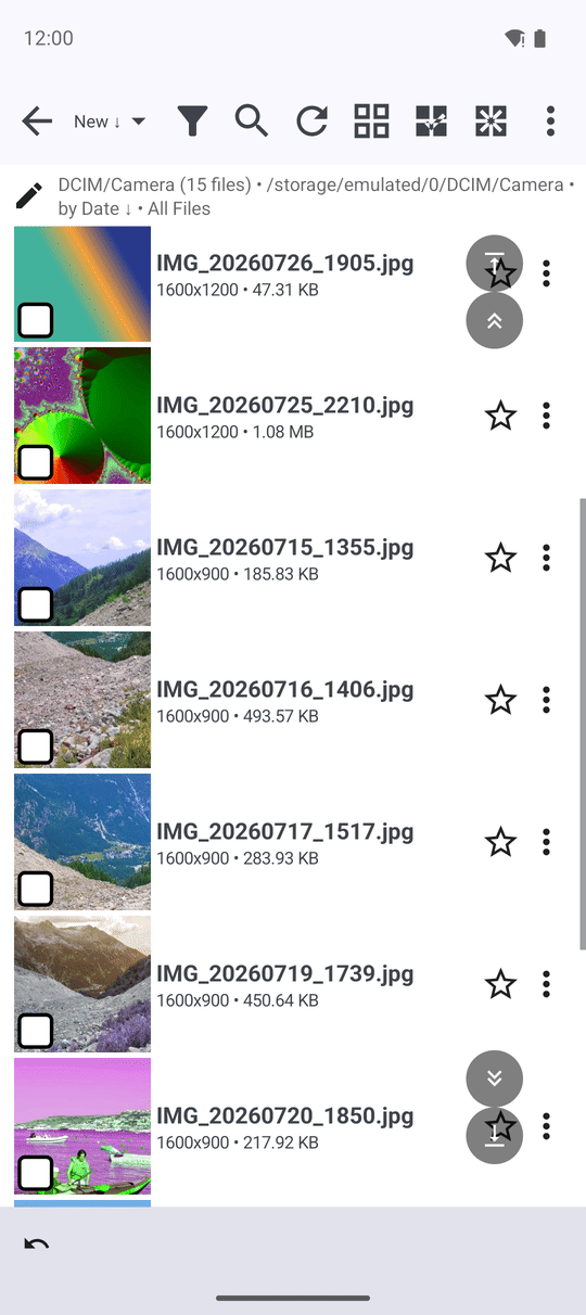 A long file list mid-scroll with the page-down floating button visible at the edge of the screen