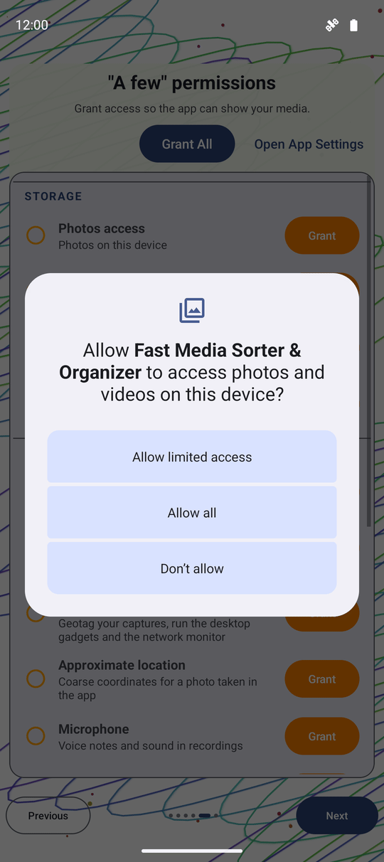Android's own storage permission dialog prompt appearing over the FastMediaSorter welcome wizard permissions page