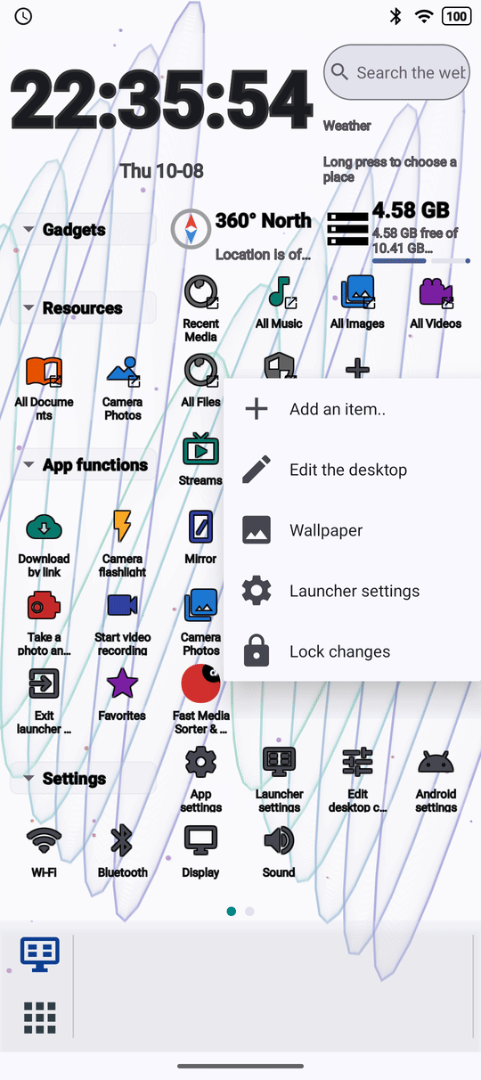 The long-press menu on an empty desktop square with Add an item, Edit the desktop, Wallpaper, Launcher settings and Lock changes