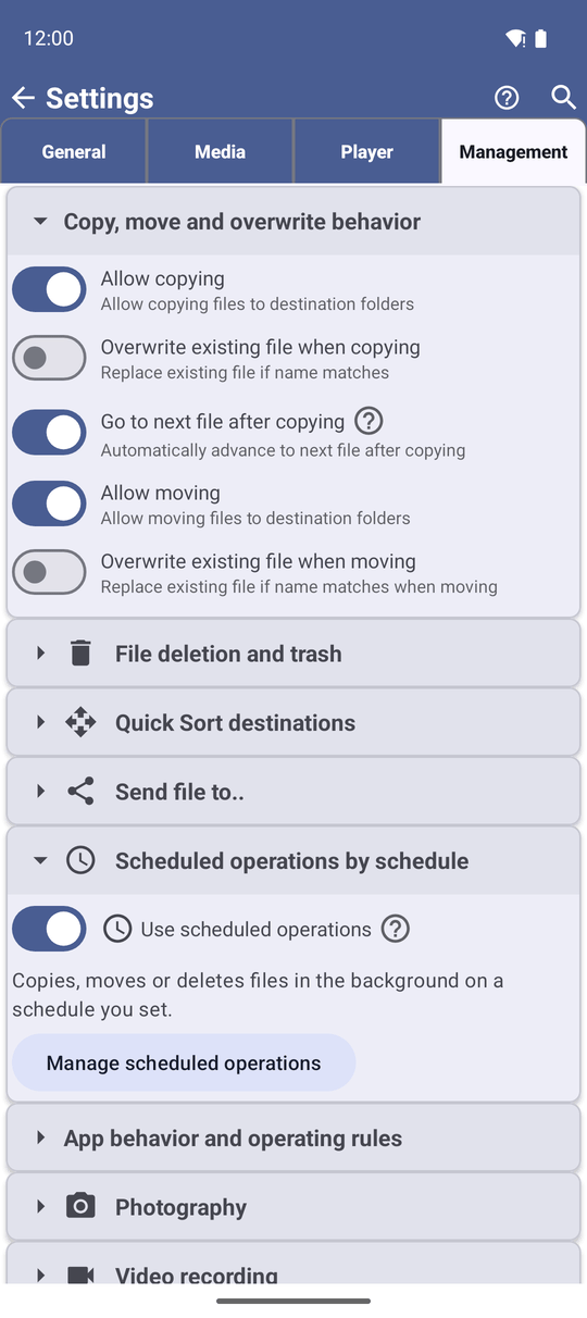 The Management tab of Settings with the Copy, move and overwrite behavior card and its Overwrite existing file when copying and Overwrite existing file when moving switches