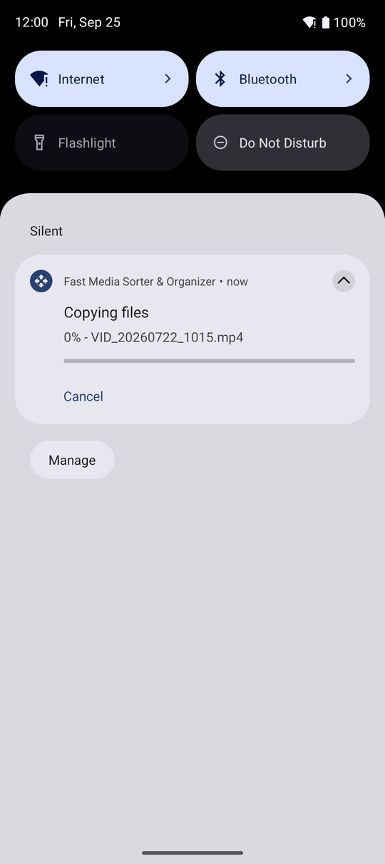 The Android notification shade with a FastMediaSorter notification reading Copying files, 42 percent and the current file name, with a Cancel button