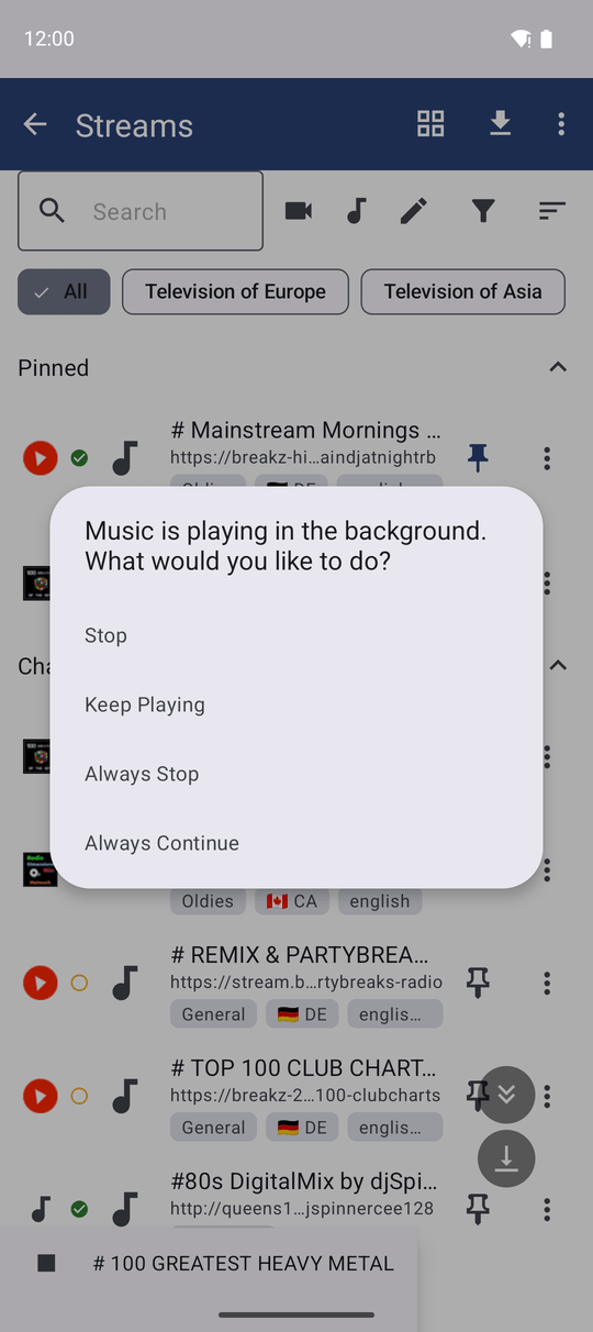 The dialog asking what to do with music playing in the background, with Stop, Keep Playing, Always Stop and Always Continue