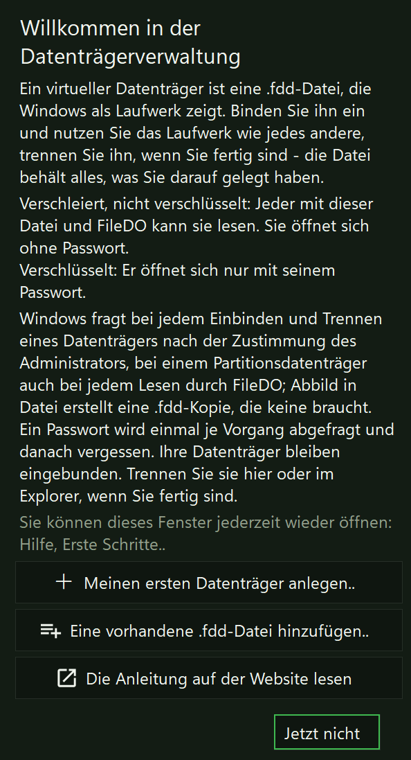 Das Fenster beim ersten Start, Willkommen in der Datenträgerverwaltung: eine kurze Erklärung, die Worte zu verschleiert und verschlüsselt, der Hinweis auf die Zustimmung eines Administrators und die Schaltflächen Meinen ersten Datenträger anlegen.., Eine vorhandene .fdd-Datei hinzufügen.., Die Anleitung auf der Website lesen und Jetzt nicht